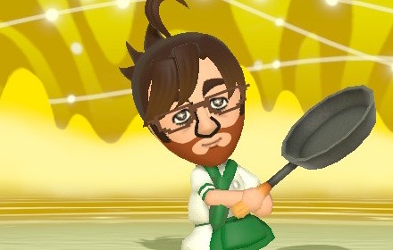 James' Mii in Miitopia. He is holding a frying pan and wearing a white chef outfit with a green apron. The background is yellow.